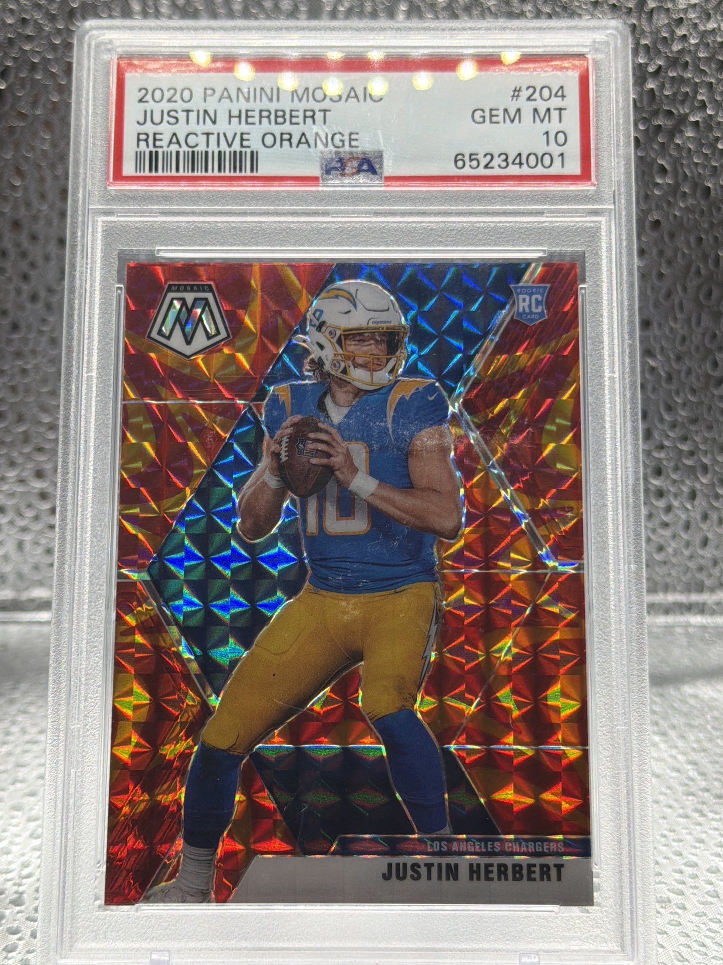 2020 Panini Mosaic #204 Justin Herbert Prizm Reactive Orange PSA 10